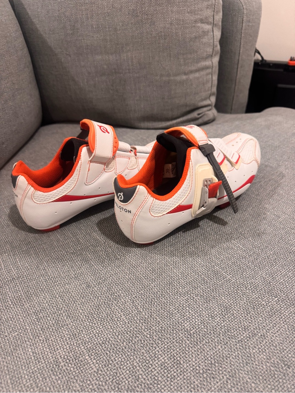Peloton White and Orange Bike Sneakers with Dial Closure